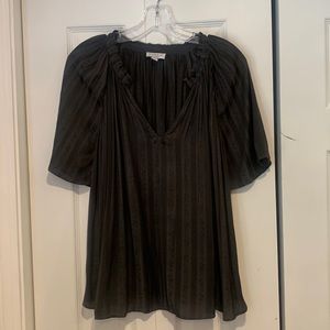 Lightweight black flutter sleeve top with monochromatic black pattern